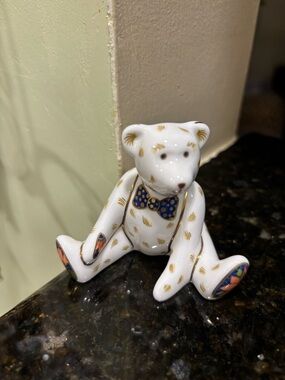 Porcelain White Bear Figurine with Gold Accents and Blue Bow